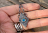 Organic triangle  pendant with an Apatite gemstone