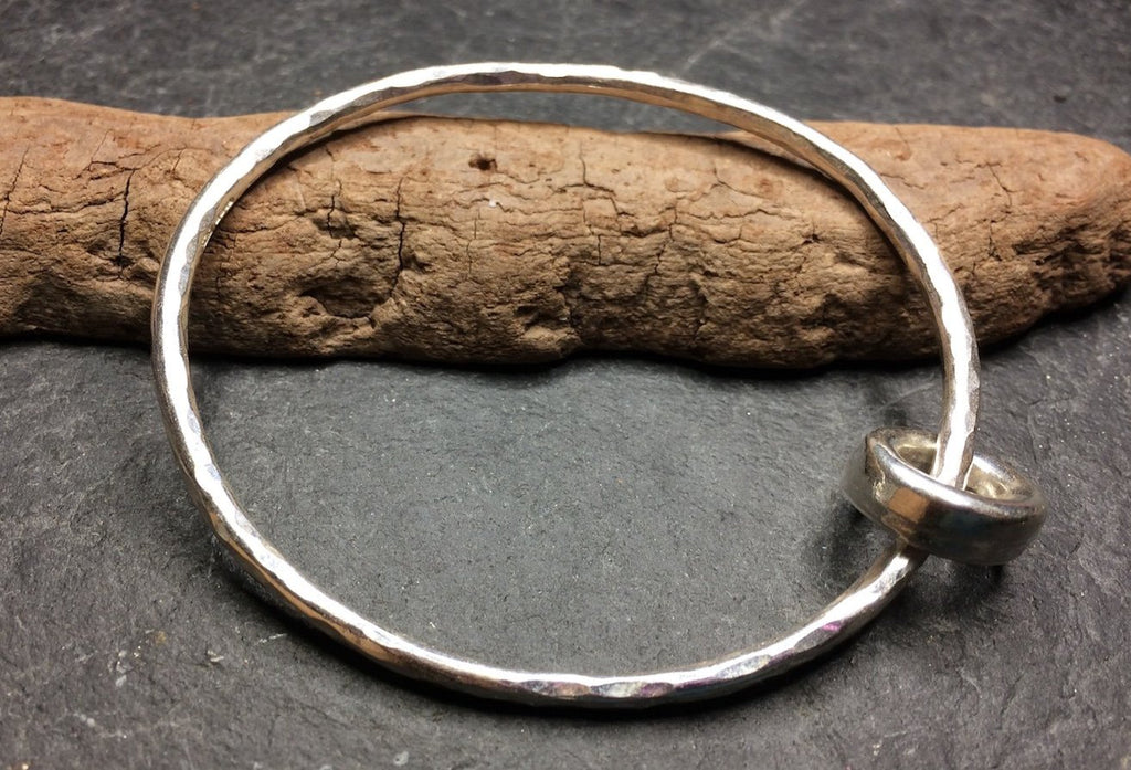 Handmade Sterling silver bangle with donut charm
