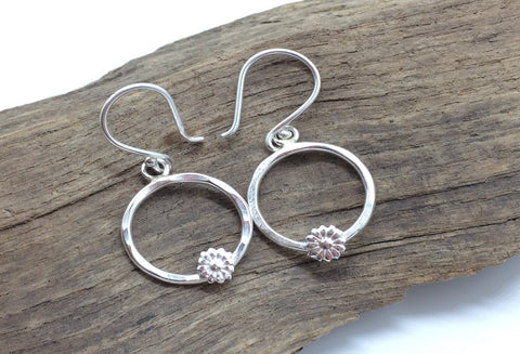Sterling silver circle earrings  with a flower
