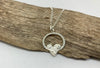 Heart shaped silver circled pendant