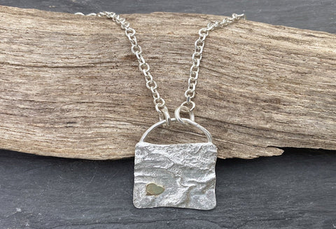 Organic silver and gold pendant