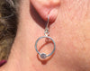 Sterling silver circle earrings  with a flower