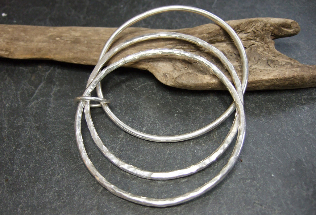 Triple textured joined bangles