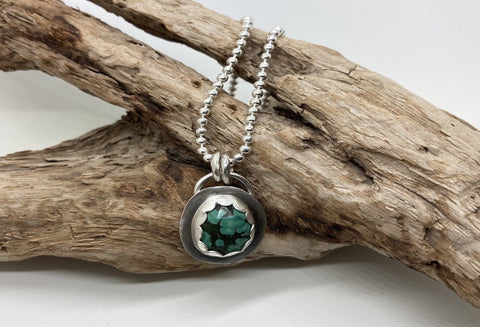 Turquoise and silver pendant